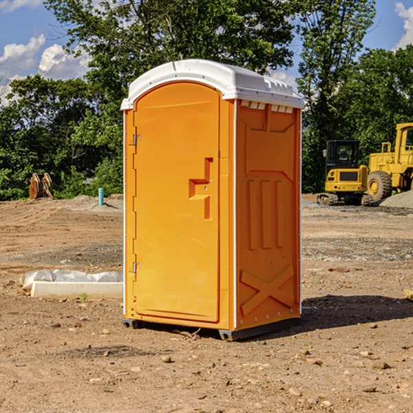 how often are the portable restrooms cleaned and serviced during a rental period in Western